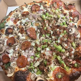 a pizza in a cardboard box