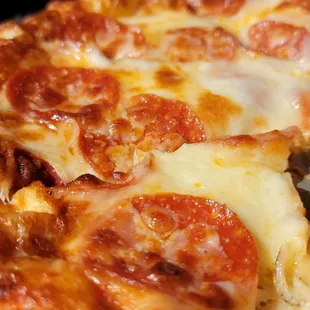 a slice taken out of a pizza