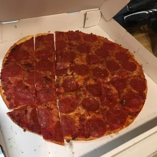 This is the pathetic pizza we got last night. And we asked for extra cheese.