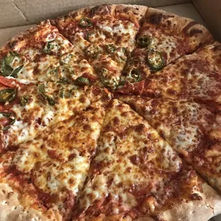 Double Pepperoni, extra cheese and Jalapeños. Simple but so damn good