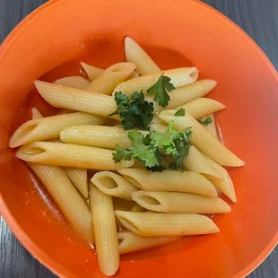 a bowl of pasta with parsley