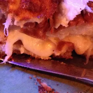 Zooming in on the cheesy garlic bread.