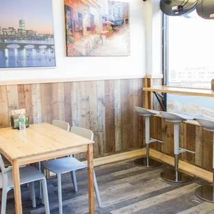 a table and chairs in a restaurant
