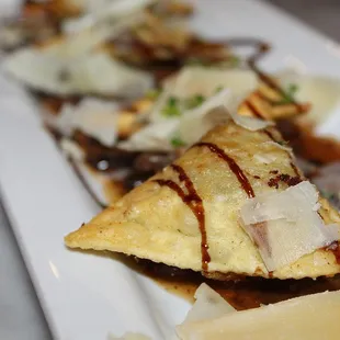 For Antipasti we started with the Fried Wild Mushroom Ravioli. The Ravioli was made with crisp ravioli, mushroom demi &amp; shaved parmesan.