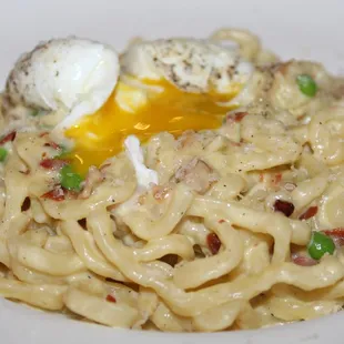 The creaminess of the sauce was enhanced by the fresh egg served atop the carbonara.