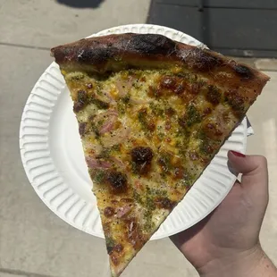 Special Slice (changes weekly)  Corn, pickled red onion, jalapeño cream and salsa verde.