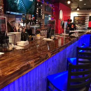 a bar with blue lights