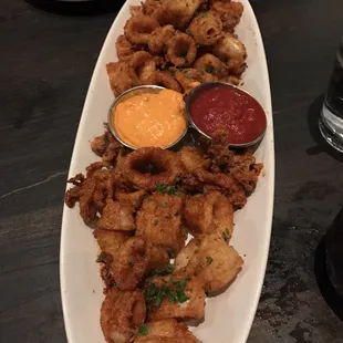 Calabrese calamari with spicy aioli and marinara. 5/5 amazing spice if you like spicy. Just the right amount of breading.