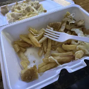 a meal in a styrofoam container