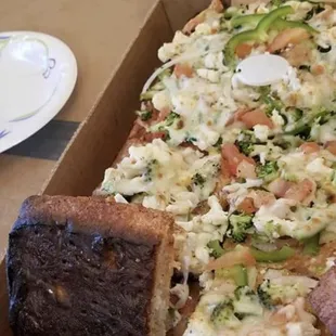 The entire crust was burnt! And the top was under cooked. Go figure!