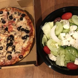 Mushroom and olive pizza Greek salad