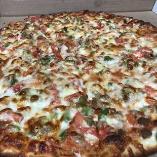 Thin Crust XL Pizza with Italian Sausage, Tomatoes, Onions, and Peppers!!!