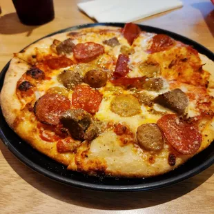a pepperoni and sausage pizza