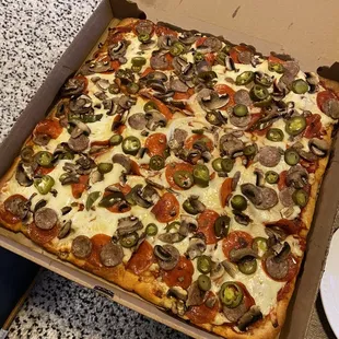 Sicilian with sausage, mushroom, jalapeño and pepperoni. It was heavenly