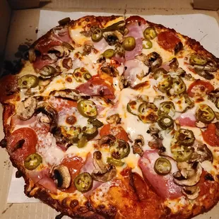 a pizza in a pizza box