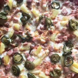 Hawaiian pizza with added jalapeños