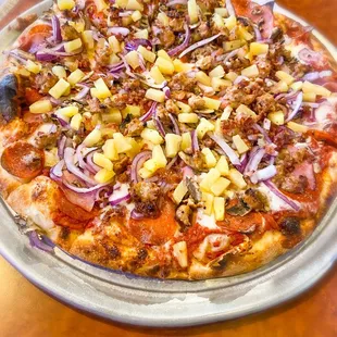 House Specialty Pizza with Pineapple added.