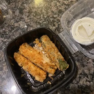 Fishy tasting fried zucchini (old grease)