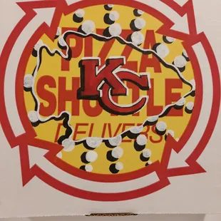 a pizza box with a pizza on it