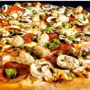 Pepperoni sausage green peppers and mushrooms