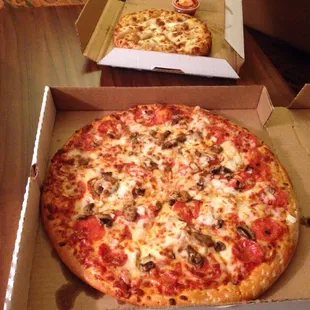 Super Meal Deal 14 inch pizza with three toppings, 12 inch bread sticks and a 2 liter soda