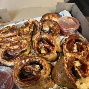 a variety of pastries in a box