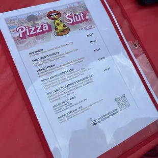 a menu on a red table