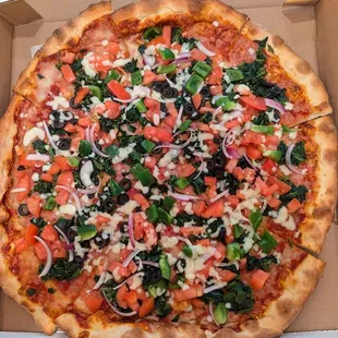 What I got: Uncooked green peppers, uncooked onion, olives, no mushrooms, uncooked spinach, chunks of uncooked tomato, and some weird sauce.