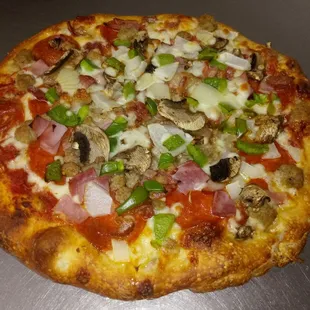 a pizza with various toppings