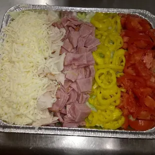 a variety of toppings in a pan