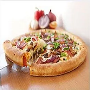 a pizza on a wooden table