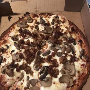 a pizza in a pizza box