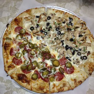 6 Topping custom Half n" Half pizza only $10.99!