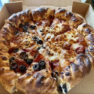 Regular crust with pepperoni and half addd black olives