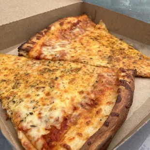 Big slices of cheese pizza.