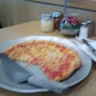 A delicious small cheese pizza under $12.00 (forgive the blur, eager to eat)!!!