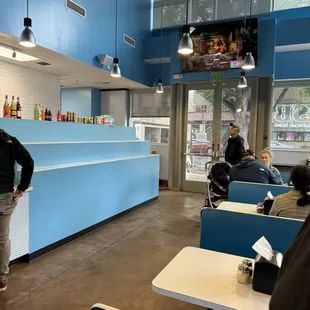 a man standing in front of a counter