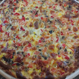 Pizzomlet (breakfast pizza) we added red pepper ourselves.