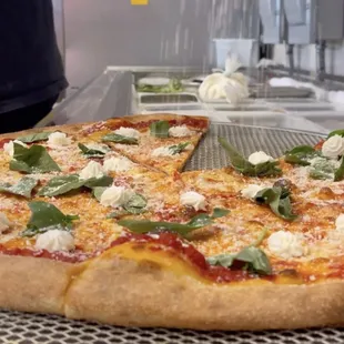 a slice taken out of a pizza