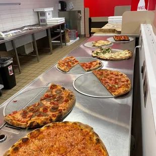 Pizza by the slice choices.