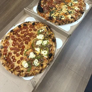 Pic of burnt pizza.   Company event so not sure how it was paid for