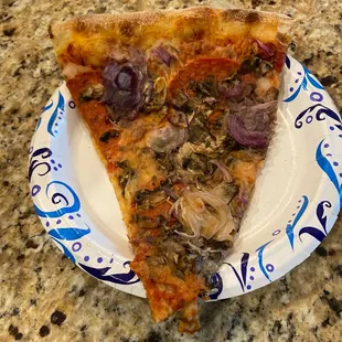 Pepperoni,sausage,red onion and mushroom pizza