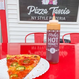 Spicy pepperoni pizza with Mike's Hot Honey