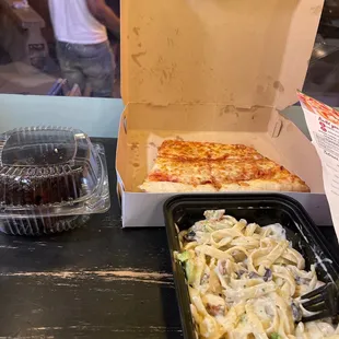 This is an eighth of the slice left after I attacked it due to Its amazing flavor , my Alfredo dinner and an amazing desert slice of cake