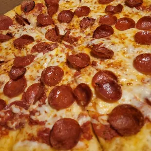 a pepperoni pizza in a box