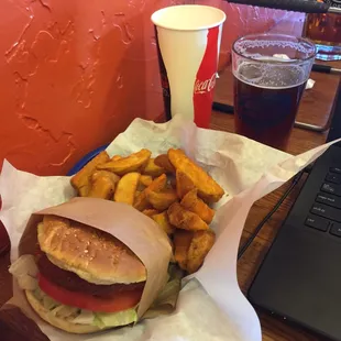 Spicy chicken burger!  Mojos and a craft beer.