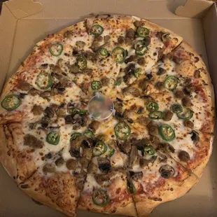a pizza in a pizza box