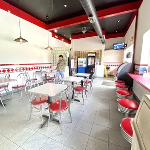 a man standing in a restaurant