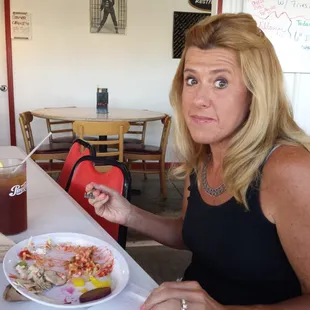 My wife enjoying the home made potato  salad