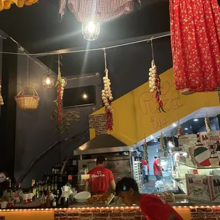 a man preparing food in a restaurant